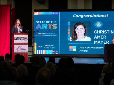 Christine speaks at the State of the Arts event