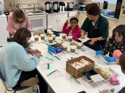Brewing Abilities Cafe students prepare coffee for delivery