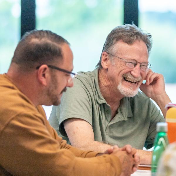 LEC member Clyde Elkins laughs during their August meeting