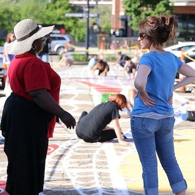 people making chalk art