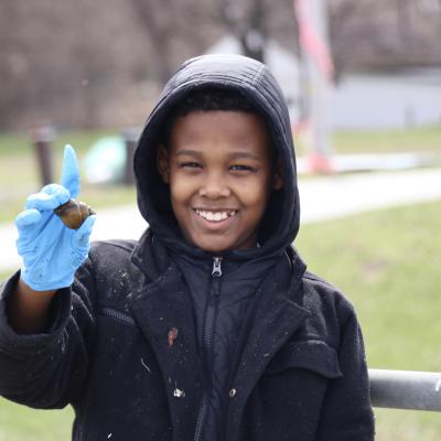 child holding snail